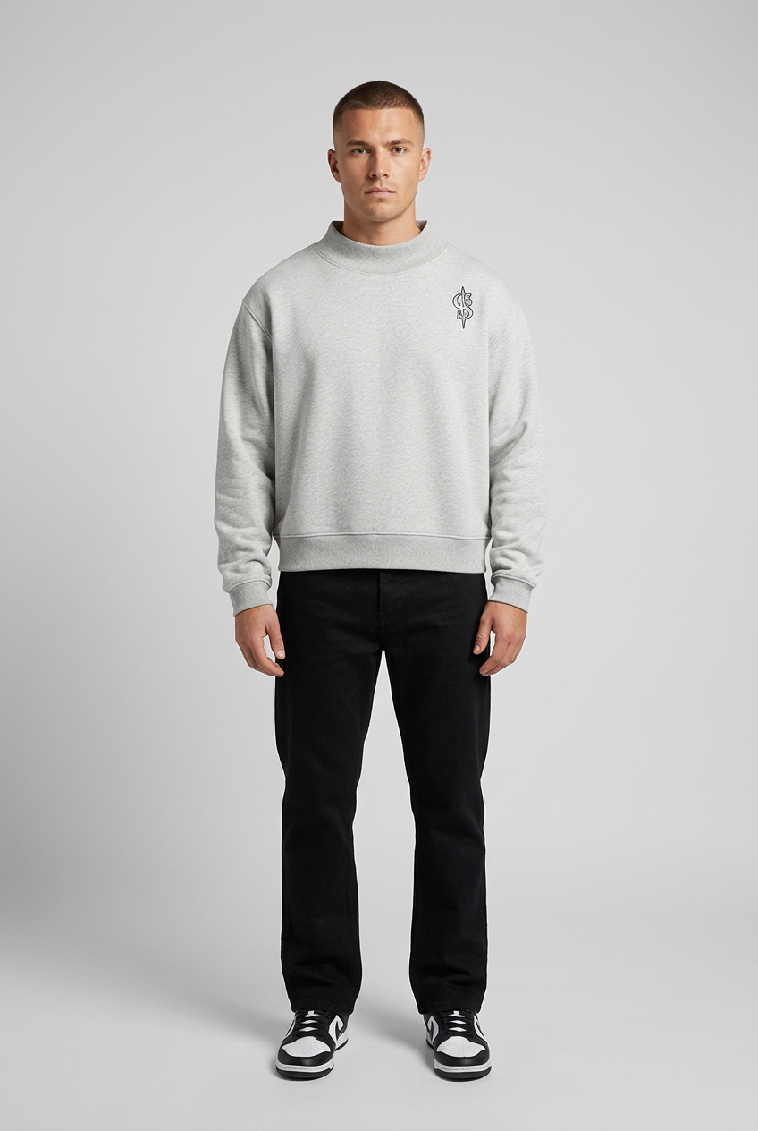 Model wearing Corrupted Sinister Essential Fleece Mock-Neck Crew Sweatshirt in light gray